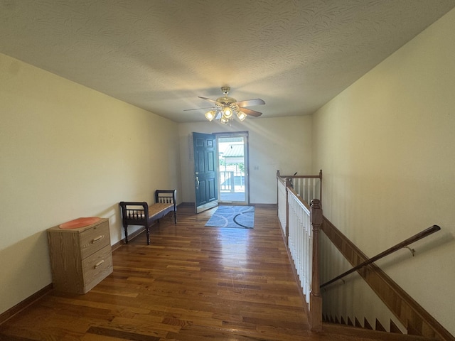 325 Lafayette Ct, Moss, TN 38575 - foyer entrance with dark wood finished floors, baseboards, ceiling fan, and a textured ceiling