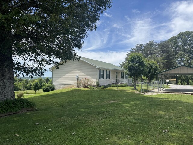 325 Lafayette Ct, Moss, TN 38575 - view of side of property featuring a carport