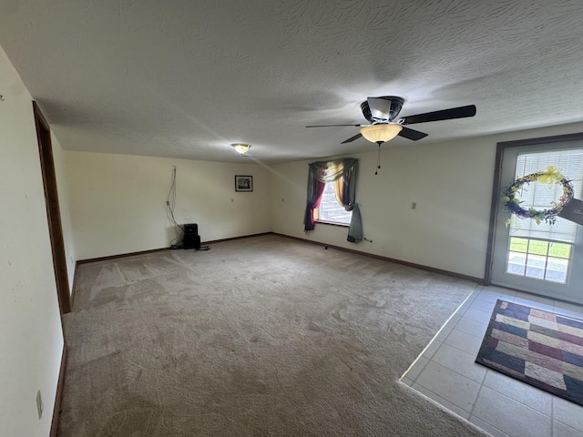325 Lafayette Ct, Moss, TN 38575 - carpeted empty room with a ceiling fan, a textured ceiling, and baseboards