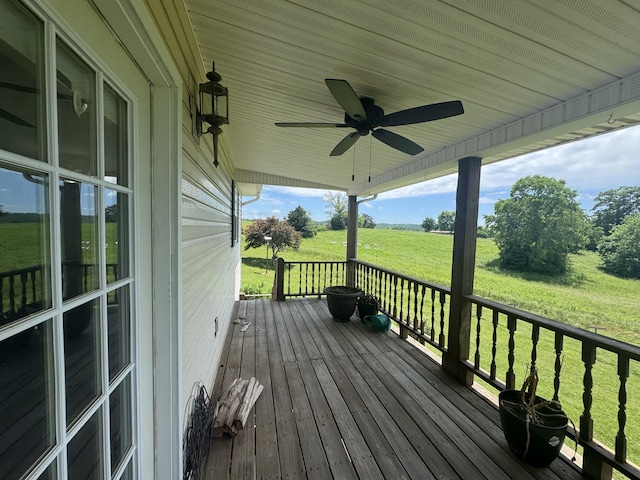 325 Lafayette Ct, Moss, TN 38575 - wooden deck with a ceiling fan and a yard