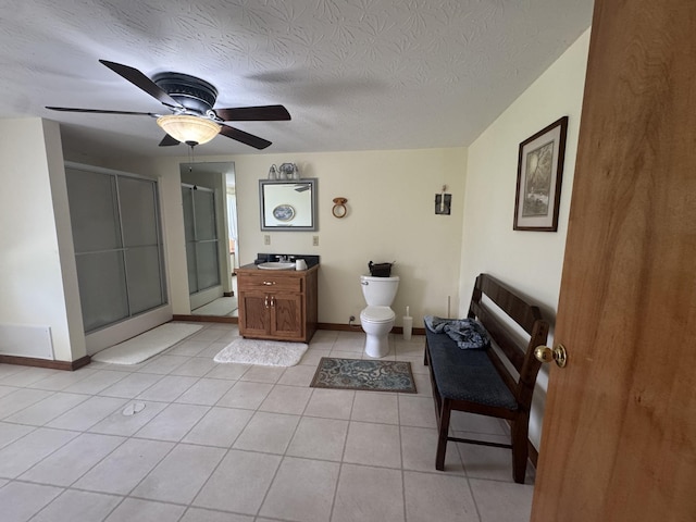 325 Lafayette Ct, Moss, TN 38575 - bathroom featuring toilet, a shower stall, vanity, tile patterned flooring, and baseboards