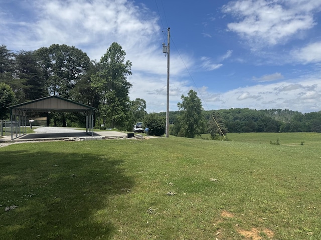 325 Lafayette Ct, Moss, TN 38575 - view of grassy yard featuring a carport