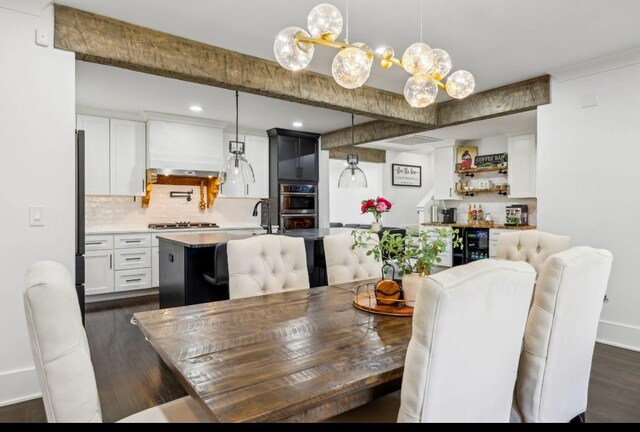 117 Park Cir, Columbia, TN 38401 - dining area with dark wood-style floors, a bar, beverage cooler, recessed lighting, and baseboards