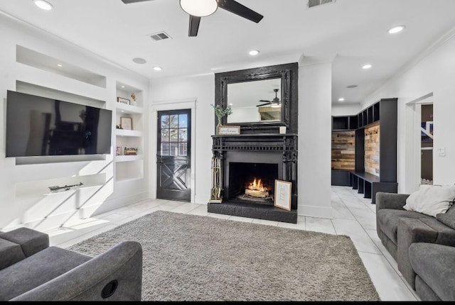 117 Park Cir, Columbia, TN 38401 - tiled living room featuring a ceiling fan, built in shelves, a large fireplace, and recessed lighting