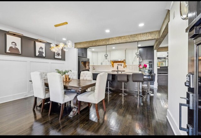 117 Park Cir, Columbia, TN 38401 - dining room with dark wood-type flooring, recessed lighting, a decorative wall, and baseboards