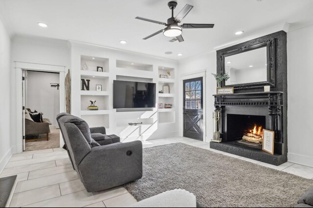 117 Park Cir, Columbia, TN 38401 - living room with built in shelves, a large fireplace, ceiling fan, recessed lighting, and tile patterned flooring
