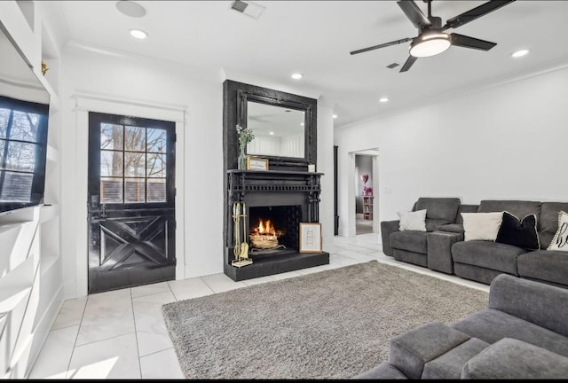 117 Park Cir, Columbia, TN 38401 - living room with ornamental molding, a ceiling fan, a fireplace, recessed lighting, and light tile patterned floors
