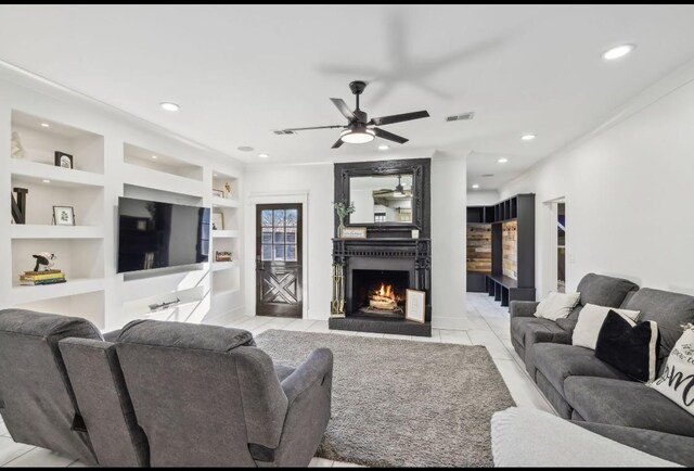 117 Park Cir, Columbia, TN 38401 - living room featuring built in shelves, a ceiling fan, recessed lighting, a fireplace, and baseboards