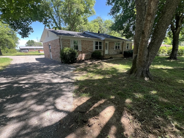 1846 Patrick Rd, Pulaski, TN 38478 - ranch-style home with brick siding, driveway, and a front yard