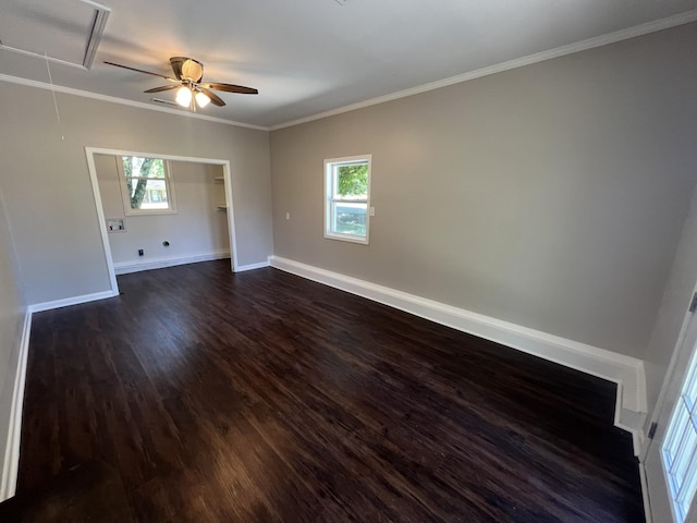 1846 Patrick Rd, Pulaski, TN 38478 - spare room featuring attic access, ceiling fan, dark wood finished floors, plenty of natural light, and ornamental molding