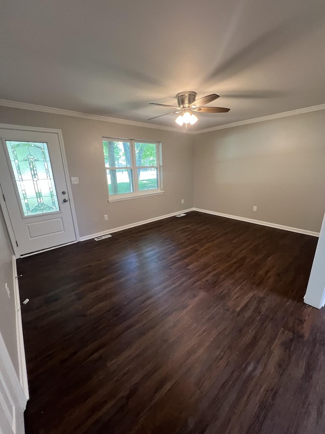 1846 Patrick Rd, Pulaski, TN 38478 - unfurnished living room featuring crown molding, baseboards, dark wood finished floors, and a ceiling fan