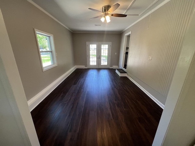 1846 Patrick Rd, Pulaski, TN 38478 - empty room with french doors, dark wood-type flooring, baseboards, ceiling fan, and ornamental molding