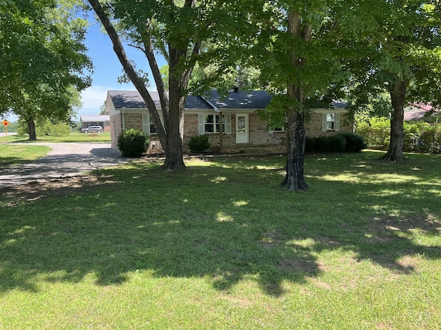 1846 Patrick Rd, Pulaski, TN 38478 - view of front of house featuring a front lawn and brick siding
