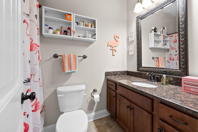 258 Bellshire Dr, Clarksville, TN 37043 - bathroom featuring toilet, baseboards, and vanity