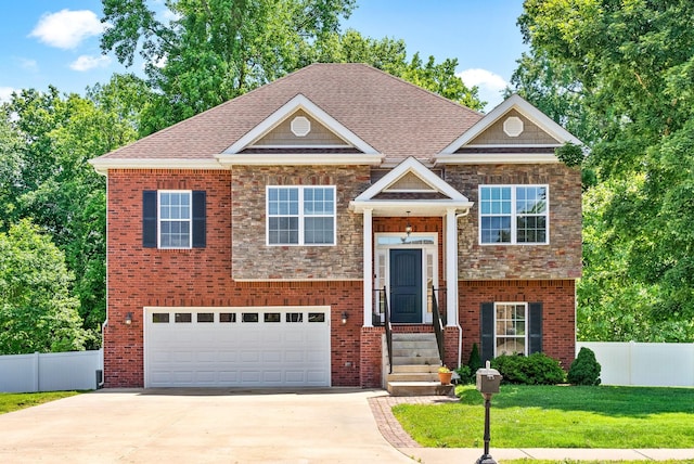 258 Bellshire Dr, Clarksville, TN 37043 - bi-level home with a garage, driveway, and brick siding