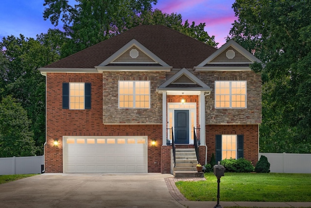258 Bellshire Dr, Clarksville, TN 37043 - view of front of house featuring a garage, driveway, and brick siding