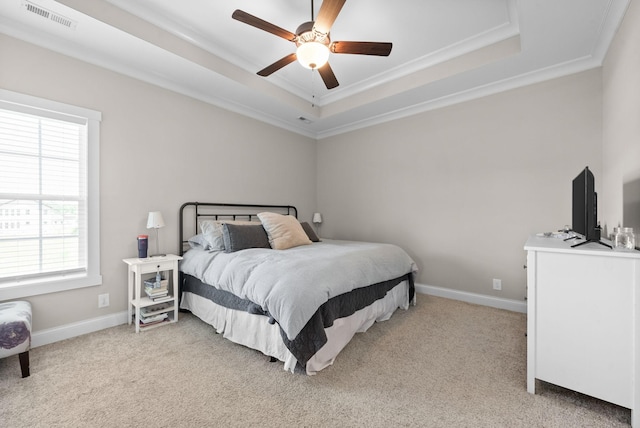 258 Bellshire Dr, Clarksville, TN 37043 - bedroom with a tray ceiling, light carpet, ornamental molding, and baseboards