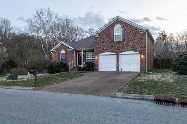 214 Cobblestone Lndg, Mount Juliet, TN 37122 - traditional-style home with brick siding, concrete driveway, and an attached garage