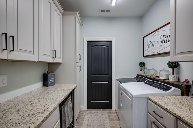 1092 Meeks Cemetery Rd, Burns, TN 37029 - laundry area featuring washer and clothes dryer, cabinet space, and wine cooler