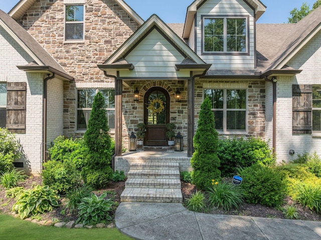 1092 Meeks Cemetery Rd, Burns, TN 37029 - view of front facade featuring stone siding and a shingled roof