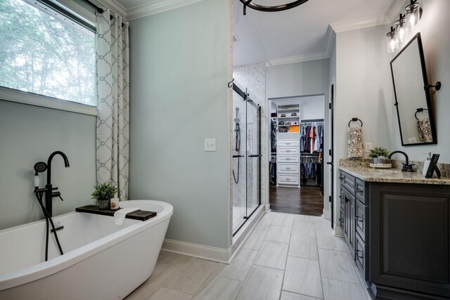 1092 Meeks Cemetery Rd, Burns, TN 37029 - bathroom with a shower stall, a spacious closet, vanity, a freestanding bath, and ornamental molding