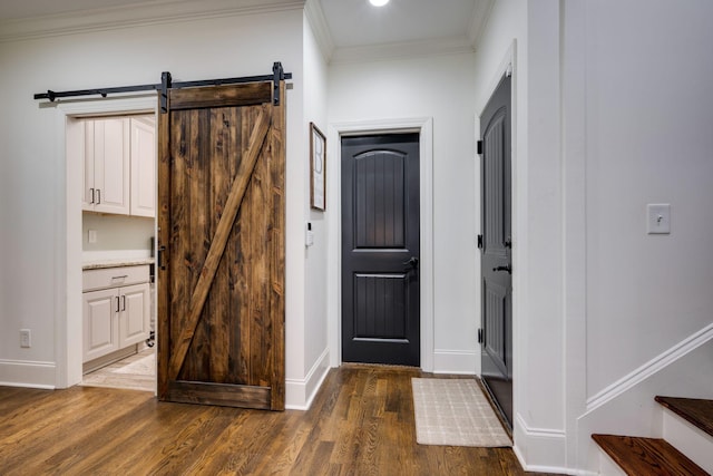 1092 Meeks Cemetery Rd, Burns, TN 37029 - foyer featuring wood finished floors, a barn door, ornamental molding, and baseboards