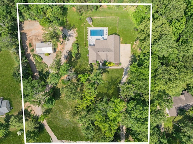 1092 Meeks Cemetery Rd, Burns, TN 37029 - aerial overview of property's location with property parcel outlined and a pool