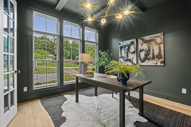 1438 Janie Ave, Nashville, TN 37216 - office space featuring wood finished floors, plenty of natural light, and a chandelier