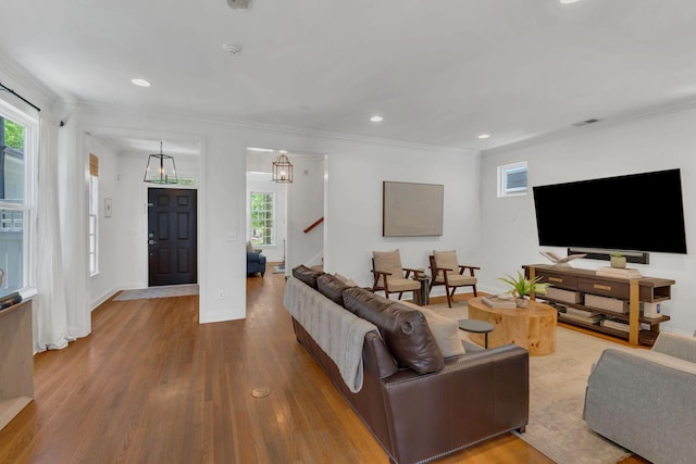 118 Jasper Ave, Franklin, TN 37064 - living room featuring wood finished floors, stairway, recessed lighting, ornamental molding, and baseboards