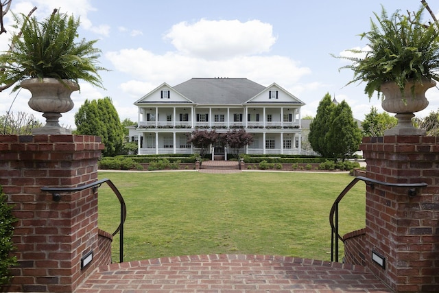 118 Jasper Ave, Franklin, TN 37064 - rear view of property with a lawn and a balcony