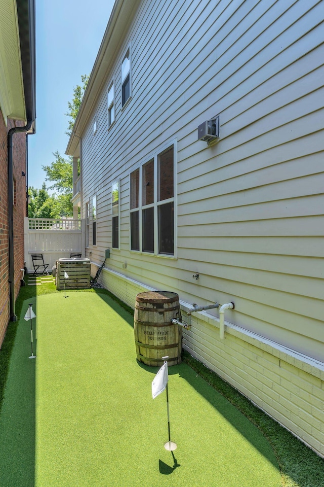 118 Jasper Ave, Franklin, TN 37064 - view of yard featuring an area to practice putting and central AC unit