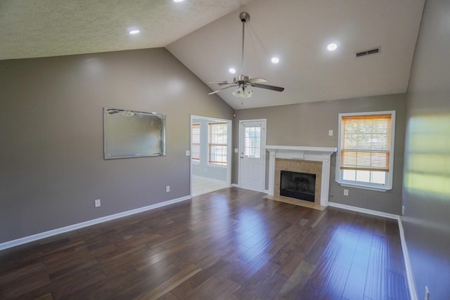 1009 Monticello Pl, Gallatin, TN 37066 - unfurnished living room with a ceiling fan, dark wood finished floors, plenty of natural light, baseboards, and high vaulted ceiling