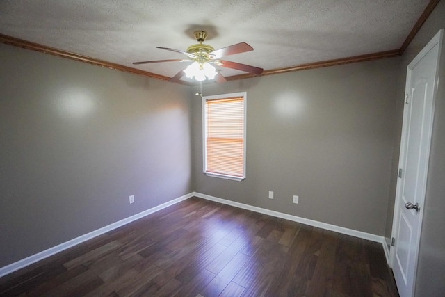 1009 Monticello Pl, Gallatin, TN 37066 - spare room featuring a ceiling fan, crown molding, dark wood-type flooring, baseboards, and a textured ceiling
