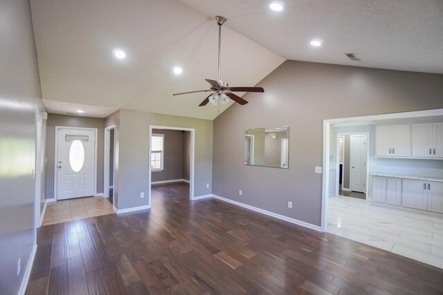 1009 Monticello Pl, Gallatin, TN 37066 - unfurnished living room with ceiling fan, high vaulted ceiling, wood finished floors, baseboards, and recessed lighting
