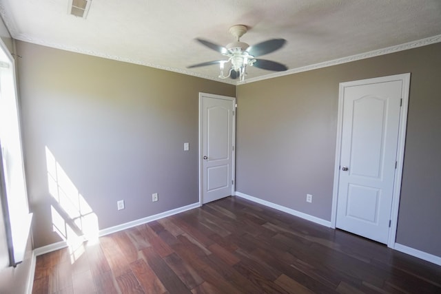 1009 Monticello Pl, Gallatin, TN 37066 - unfurnished bedroom with dark wood-style flooring, baseboards, crown molding, ceiling fan, and multiple windows