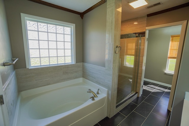 1009 Monticello Pl, Gallatin, TN 37066 - bathroom with crown molding, a bath, a stall shower, plenty of natural light, and marble finish floors