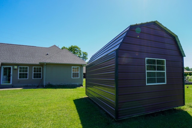 1009 Monticello Pl, Gallatin, TN 37066 - view of side of home with a lawn and an outbuilding