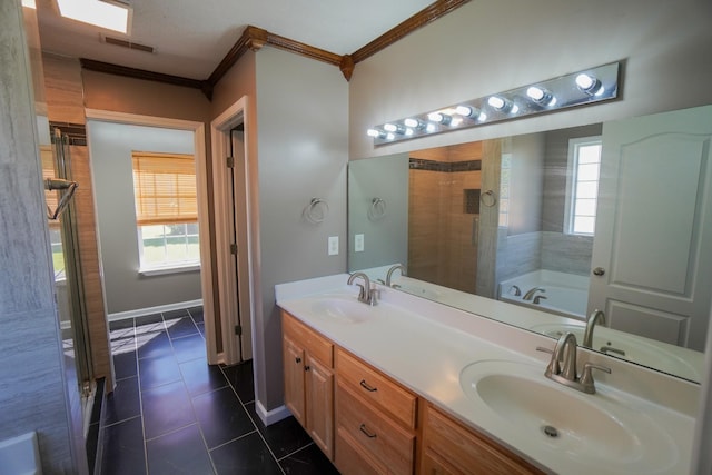 1009 Monticello Pl, Gallatin, TN 37066 - bathroom featuring crown molding, double vanity, a garden tub, healthy amount of natural light, and tile patterned flooring