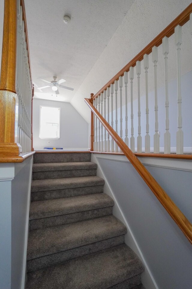 1009 Monticello Pl, Gallatin, TN 37066 - stairway with ceiling fan and vaulted ceiling