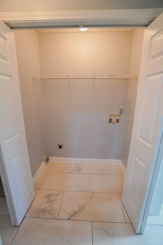 1009 Monticello Pl, Gallatin, TN 37066 - washroom featuring light marble finish flooring, washer hookup, baseboards, and hookup for an electric dryer