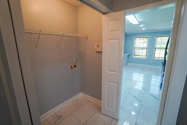 1009 Monticello Pl, Gallatin, TN 37066 - washroom featuring light marble finish floors, hookup for a washing machine, baseboards, and recessed lighting