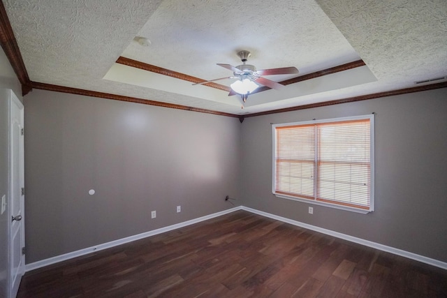 1009 Monticello Pl, Gallatin, TN 37066 - unfurnished room with a textured ceiling, a raised ceiling, dark wood-style flooring, ceiling fan, and baseboards