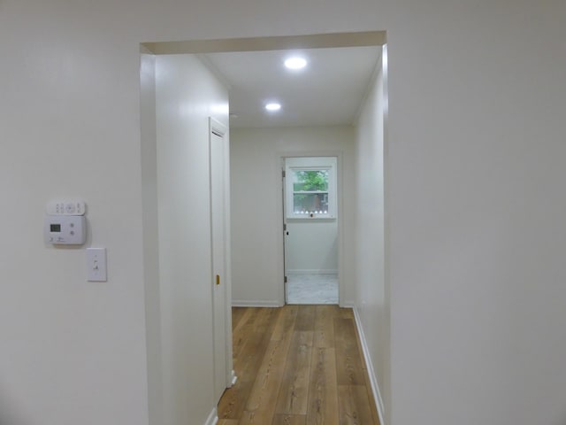205 W 5th St, Parsons, TN 38363 - hall featuring light wood-type flooring, recessed lighting, and baseboards