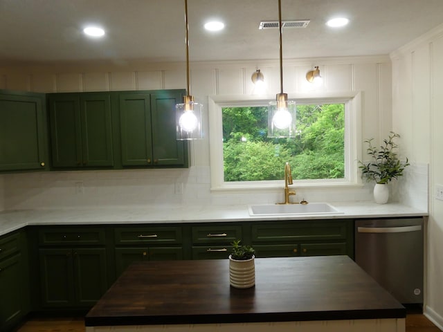 205 W 5th St, Parsons, TN 38363 - kitchen featuring stainless steel dishwasher, a sink, green cabinets, a kitchen island, and recessed lighting