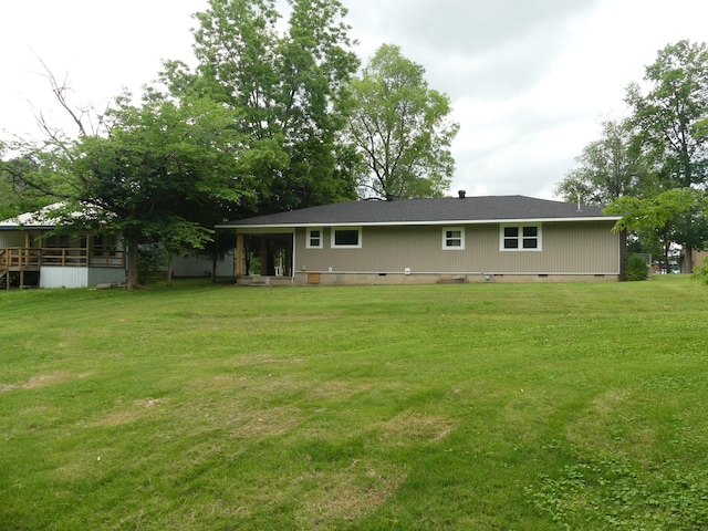 205 W 5th St, Parsons, TN 38363 - rear view of property with crawl space and a lawn
