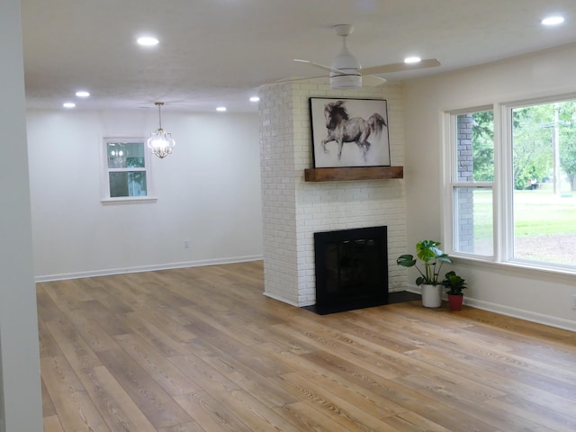 205 W 5th St, Parsons, TN 38363 - unfurnished living room with ceiling fan, wood finished floors, healthy amount of natural light, and recessed lighting
