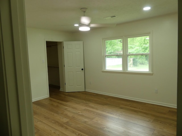 205 W 5th St, Parsons, TN 38363 - empty room with ceiling fan, light wood-style floors, baseboards, and recessed lighting