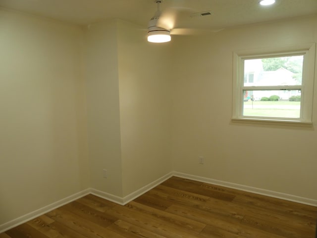 205 W 5th St, Parsons, TN 38363 - empty room featuring wood finished floors, baseboards, ceiling fan, and recessed lighting