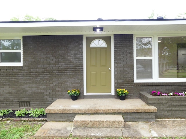 205 W 5th St, Parsons, TN 38363 - doorway to property with crawl space and brick siding