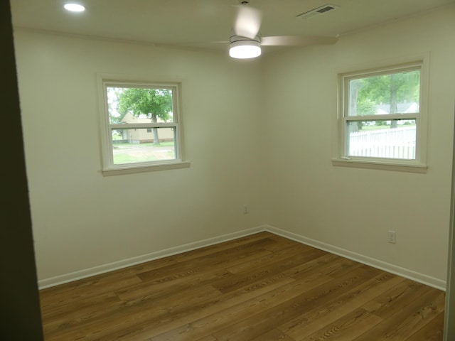205 W 5th St, Parsons, TN 38363 - unfurnished room with wood finished floors, ceiling fan, baseboards, and recessed lighting